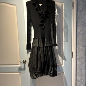 Black midi dress . Size XL/L . Ruffled top and belled skirt .